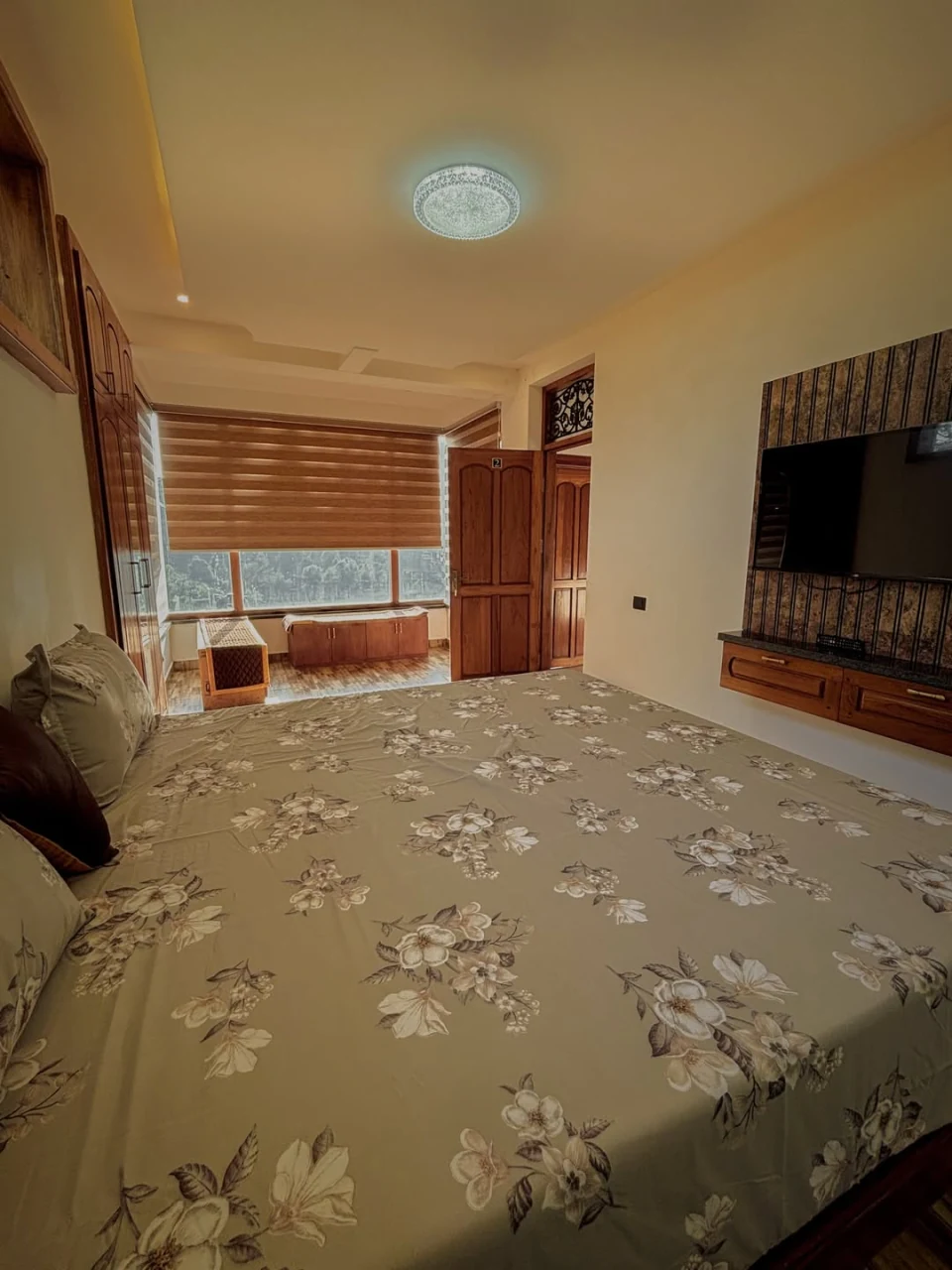 Comfortable bedroom with warm wooden details