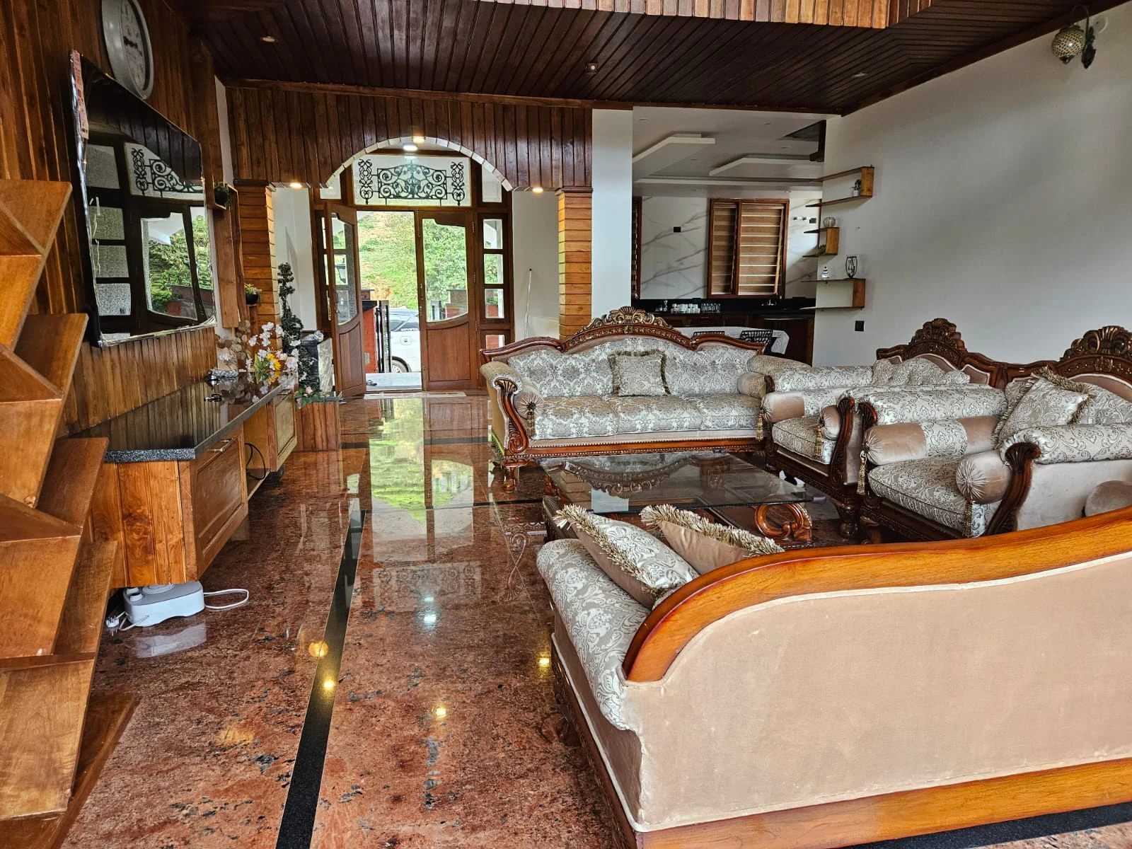 Hall seating area with sofa and warm lighting